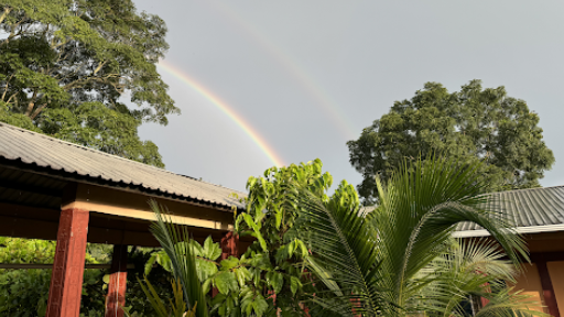 rainbow over the health clinic and Honduran rainforest